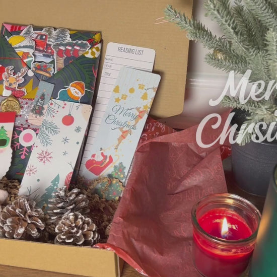Video showing the Christmas Blind Date with a Book Box and its festive contents.
