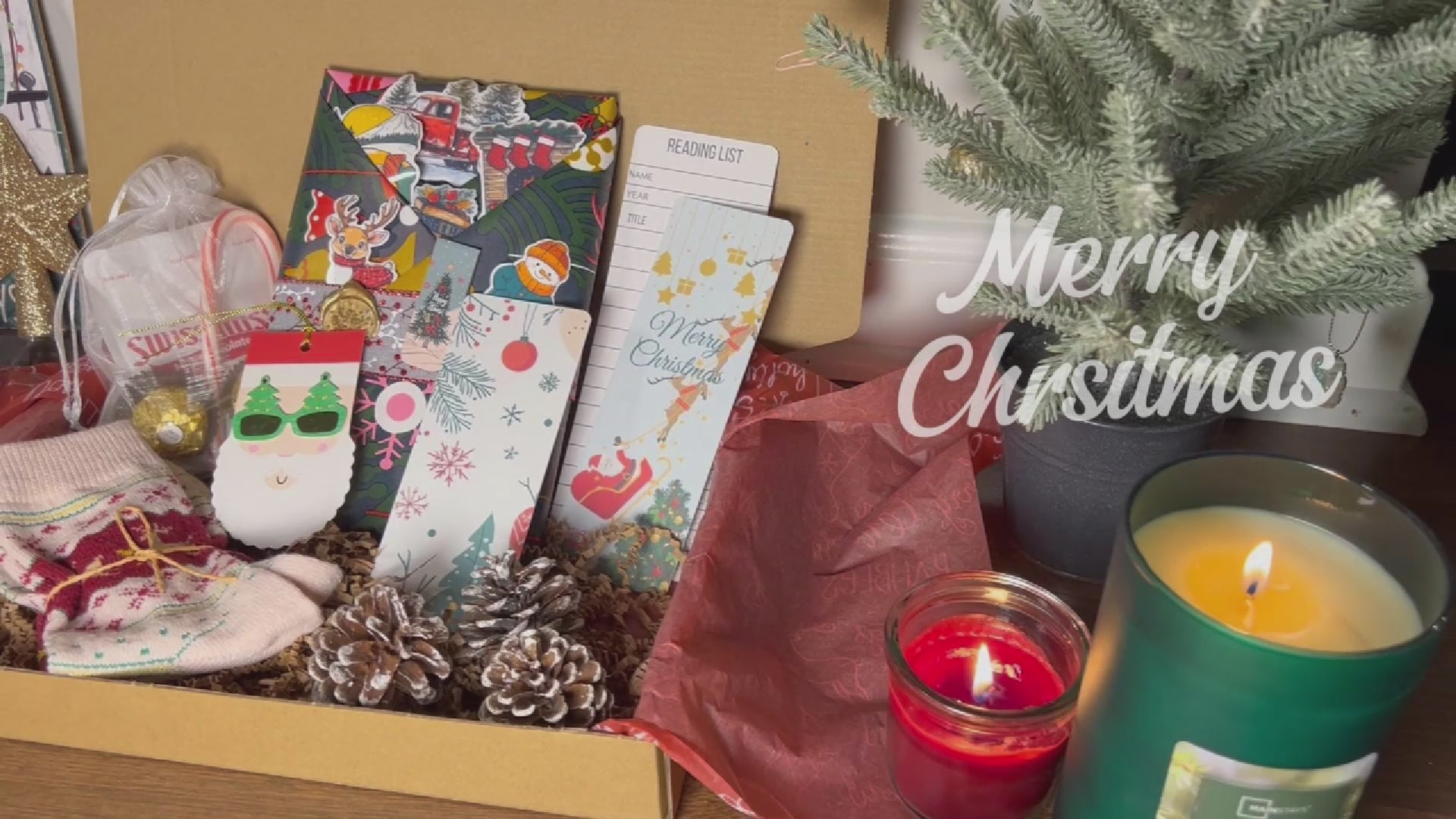 Video showing the Christmas Blind Date with a Book Box and its festive contents.